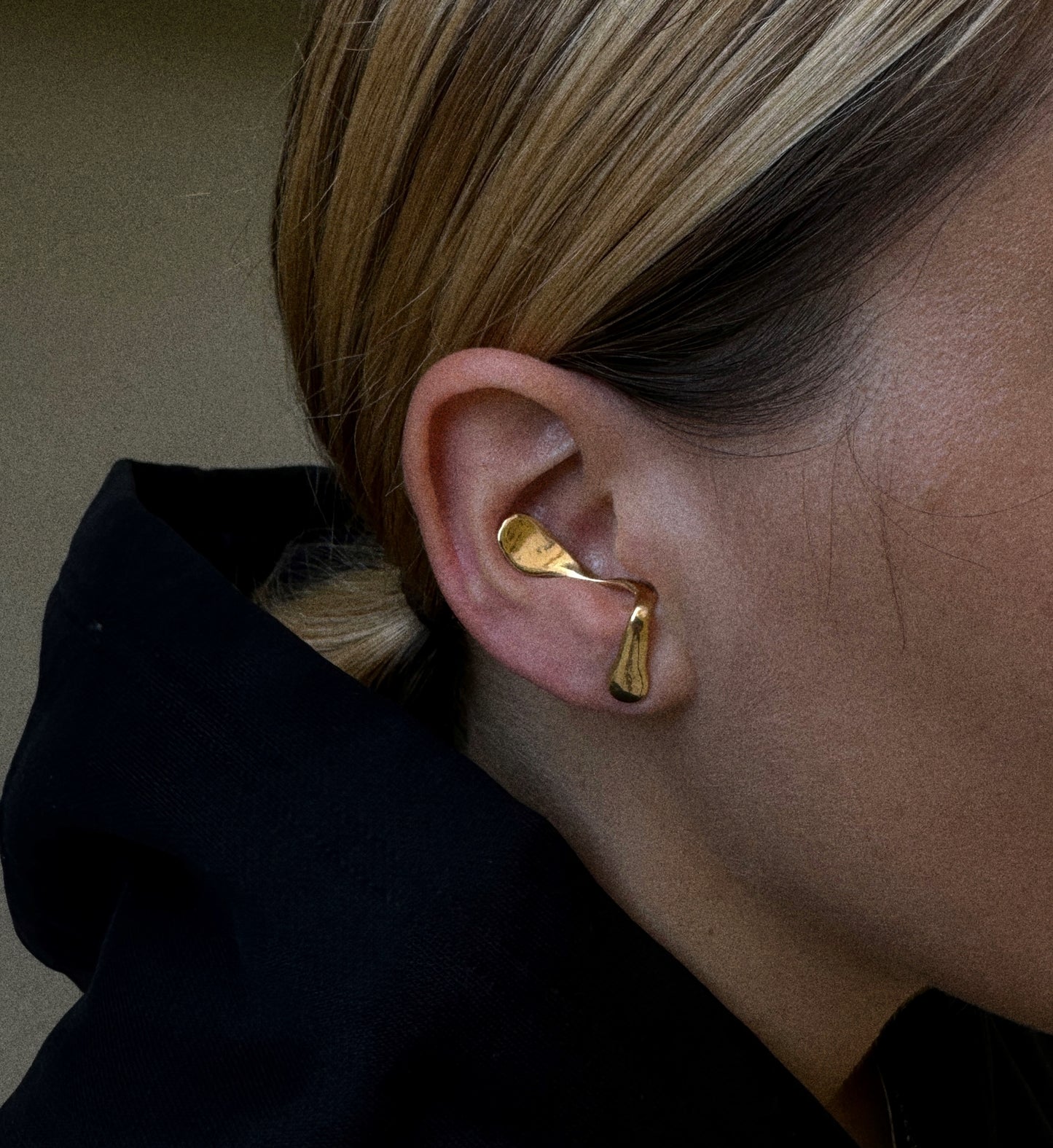 The melted ear piece Gold plated