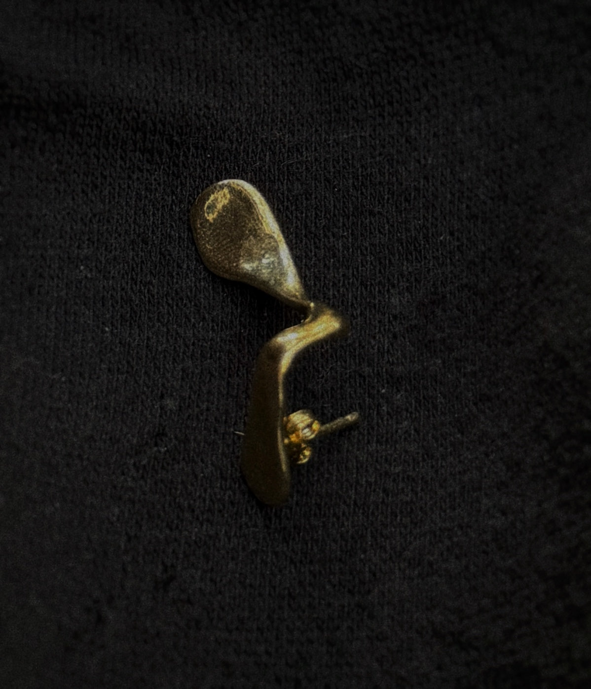 The melted ear piece Gold plated