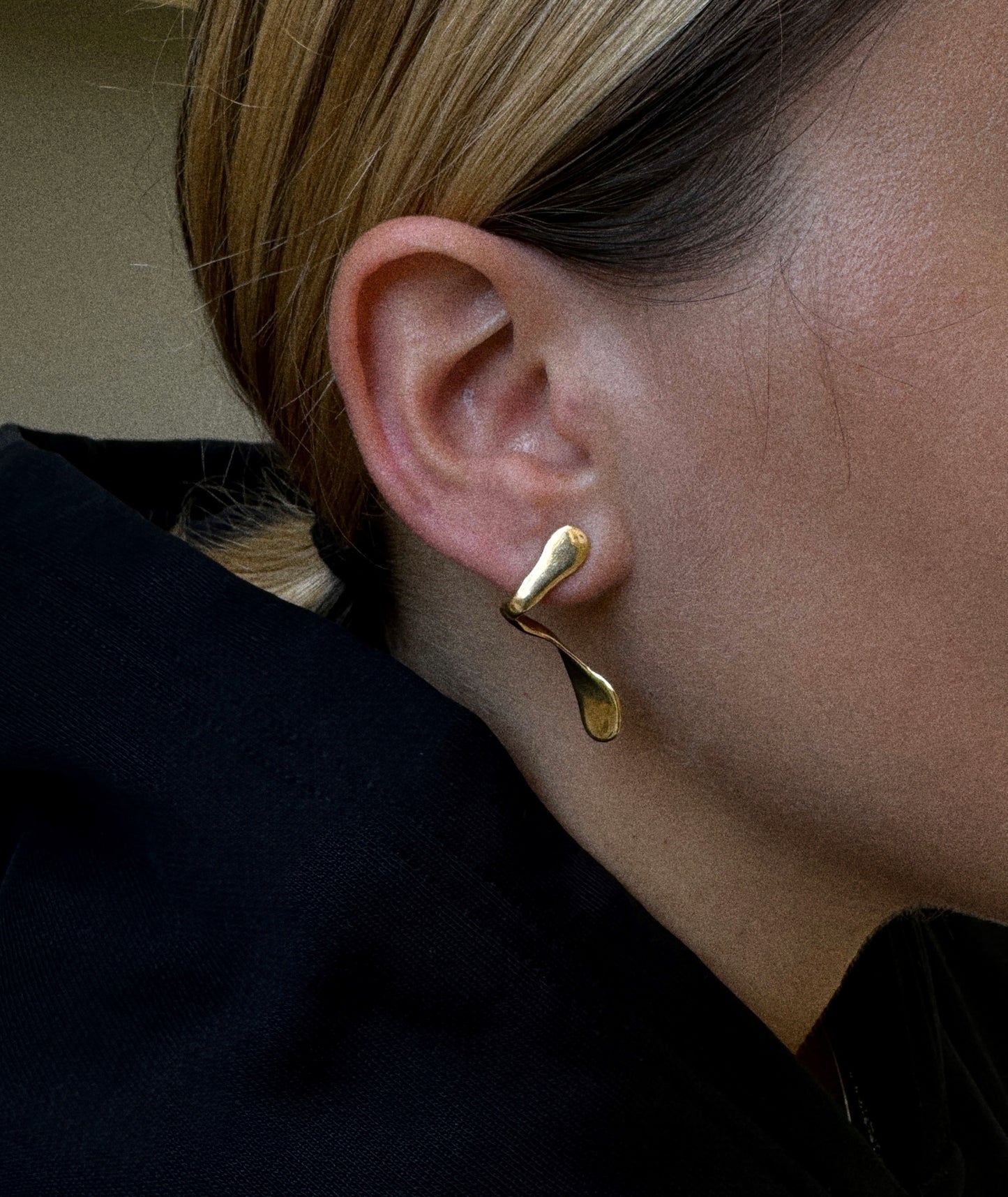 The melted ear piece Gold plated